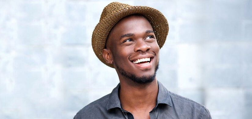 man smiling with dental bridge